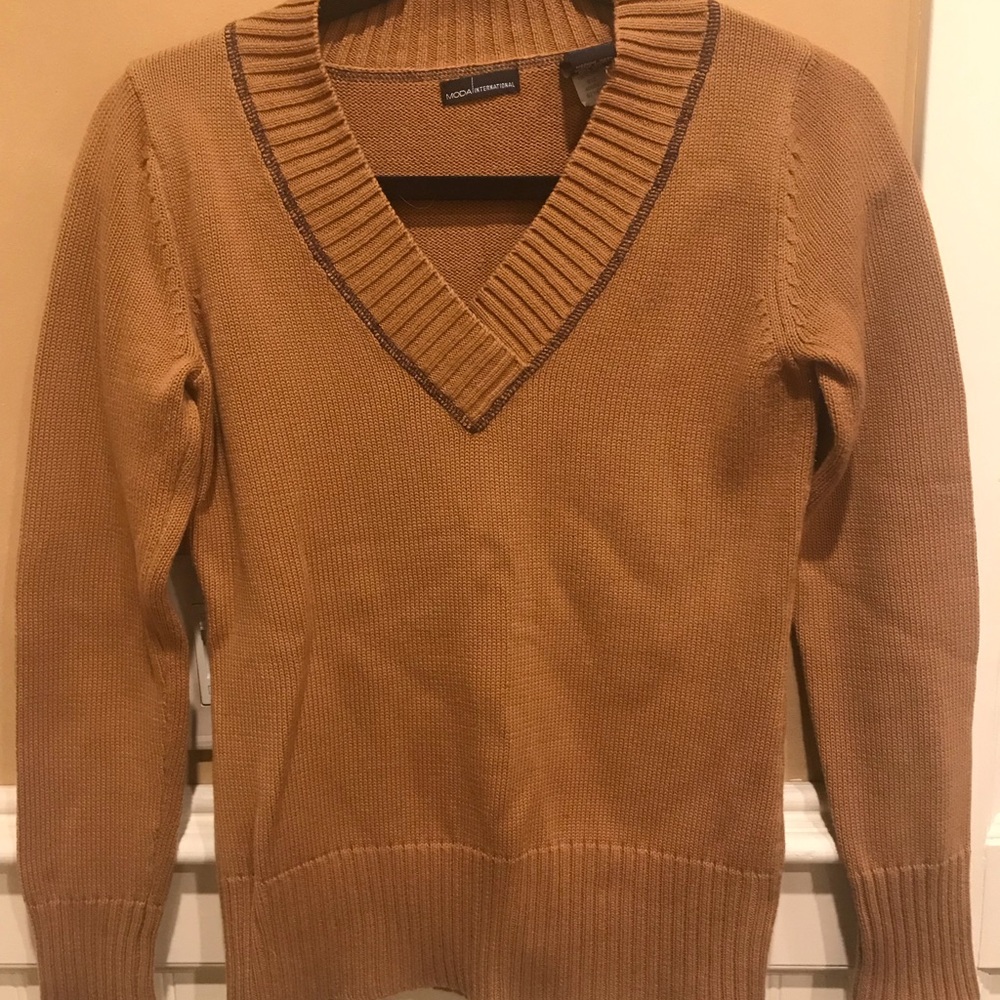 Camel sweater with black stitching